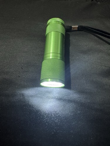 Mini pocket torch - pocket, typically